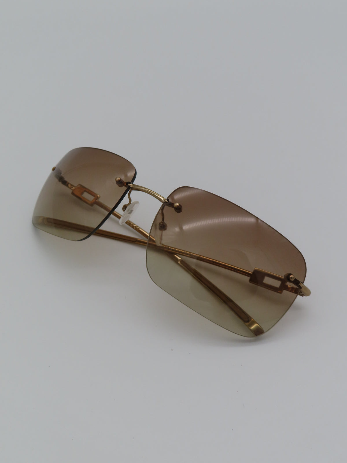 Gucci Rimless Strass Sunglasses Gold